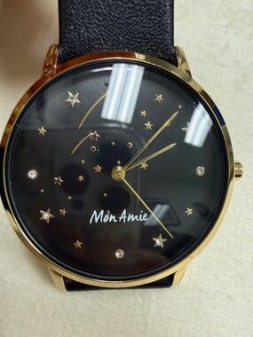 Women's Black Starburst Dial Watch with Gold Accents